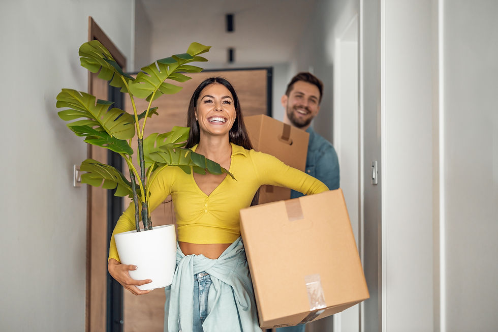 Husband and wife moving boxes