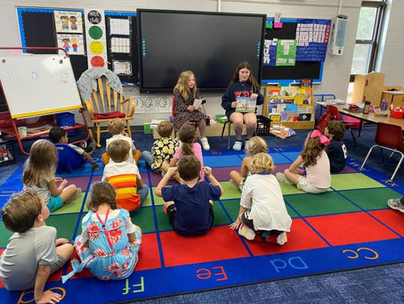 Fifth Graders Reading to the Kindergartners