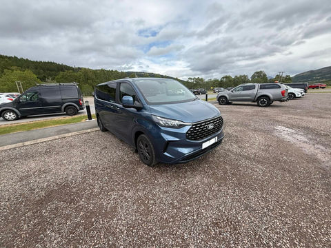 Large white Mercedes-Benz executive coach with air conditioning for group travel - GS Coach Hire