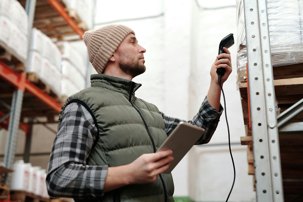 a warehouse operative scanning the EAN barcode of stock