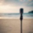 A microphone in a mic stand on the beach..jpg