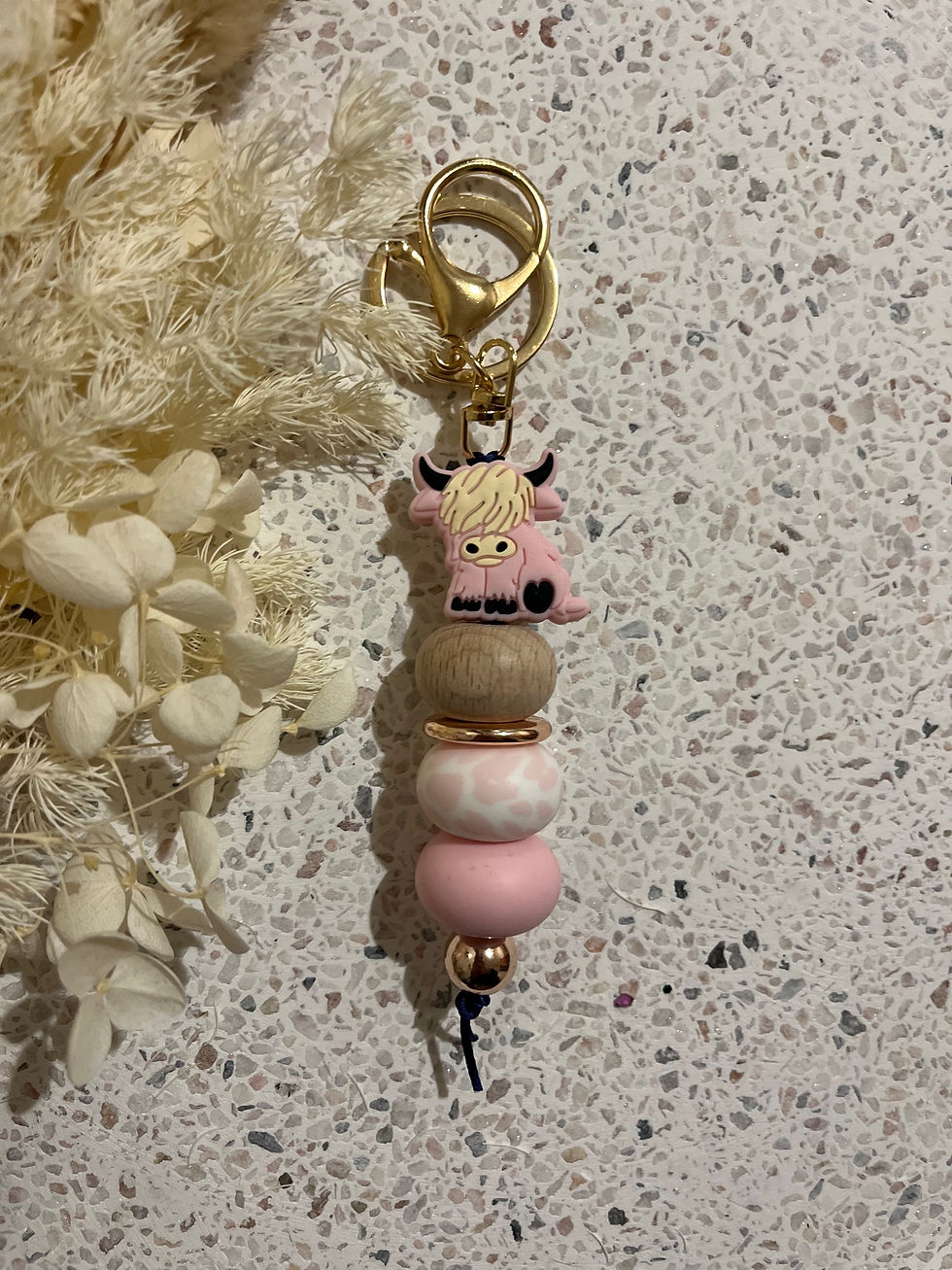 strawberry highland cow keychain