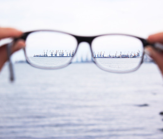 person holding eyeglasses_edited.jpg