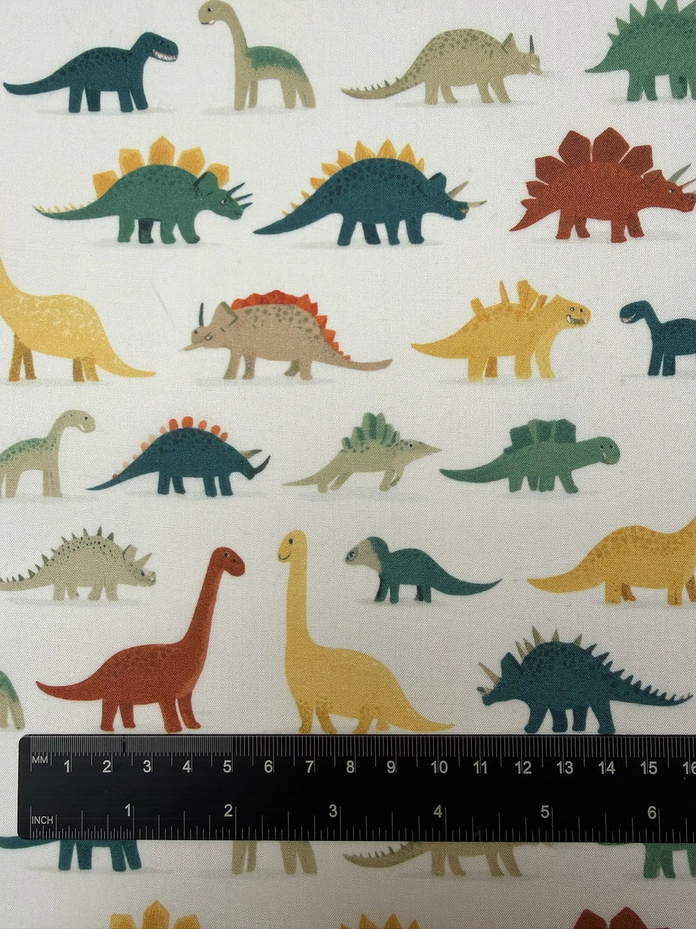 Dinosaurs Biege Polycotton Fabric Close Up