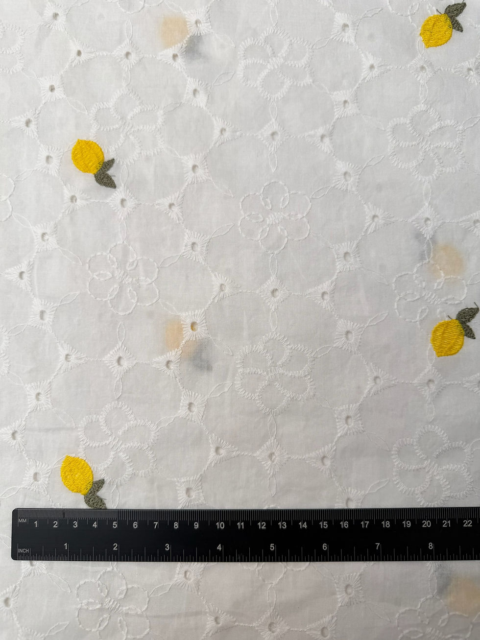 Lemons Cotton Anglaise Embroidered Fabric Close Up