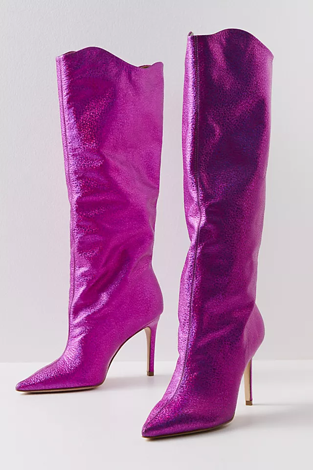 a pair of tall, shiny, hot pink high-heel boots