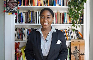 Katharine Morris in front of bookshelf