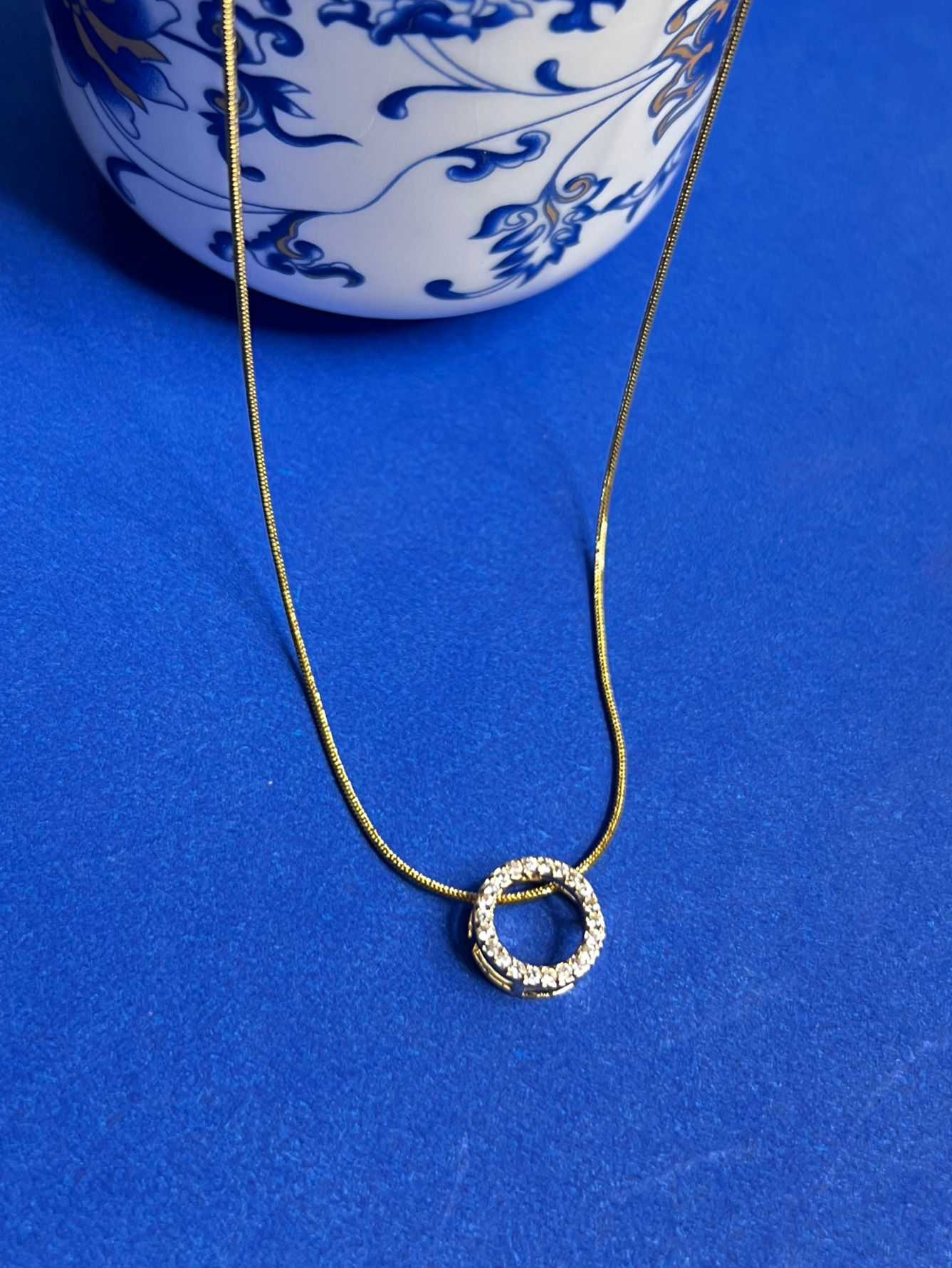 American diamond circular golden stainless steel necklace