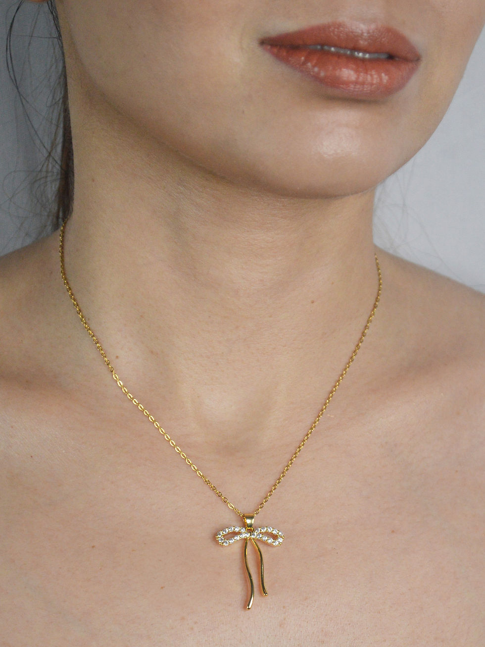 Thumbnail: AMERICAN DIAMOND BOW GOLDEN  NECKLACE