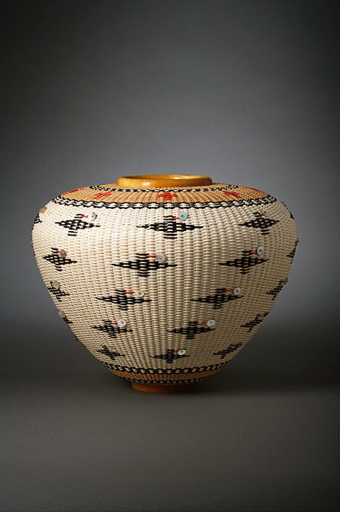 Basket with bird motif inspired by native American story handwoven baskets