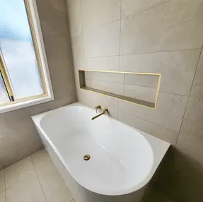 bathtub featured in modern bathroom renovation