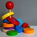 blue green yellow and red plastic toy_ed