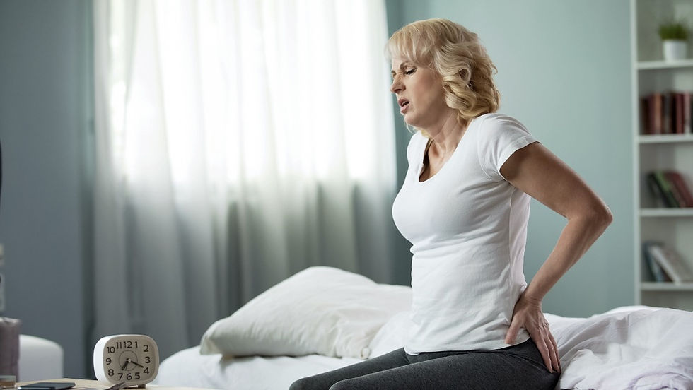 A woman suffering from lower back pain