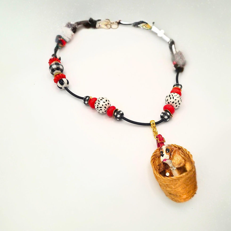 Thumbnail: Chunky artisan necklace with mixed beads and gold pendant on white surface