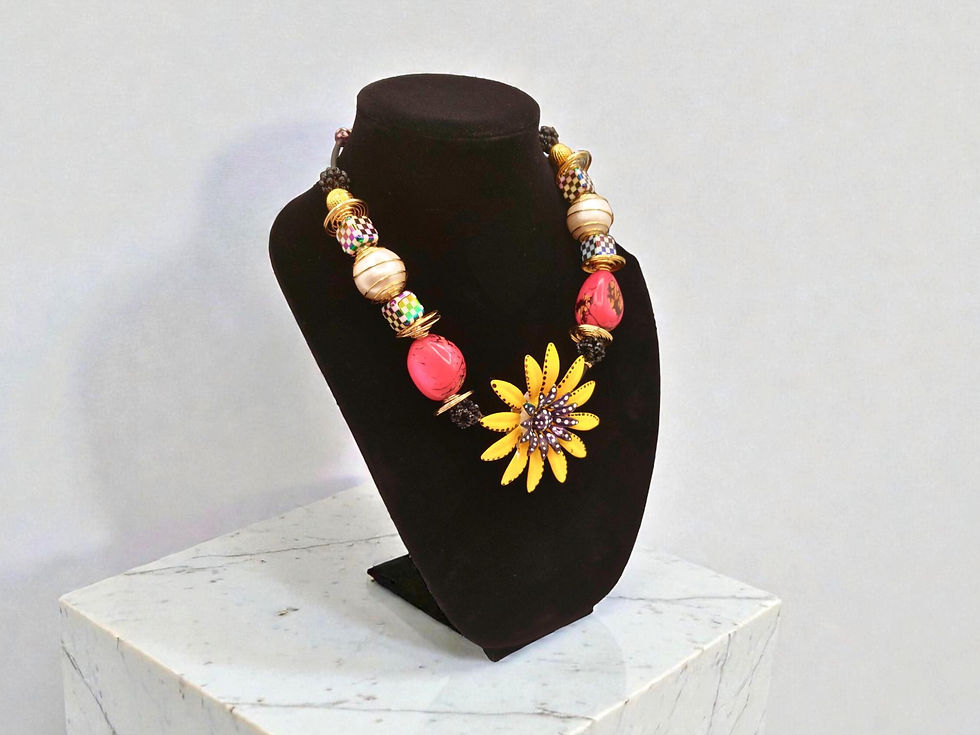 Thumbnail: Sunflower necklace with colorful beads on black stand, product display for sale