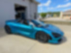 Blue McLaren 720S Spider outside Williams Automotive in Akron, Ohio.