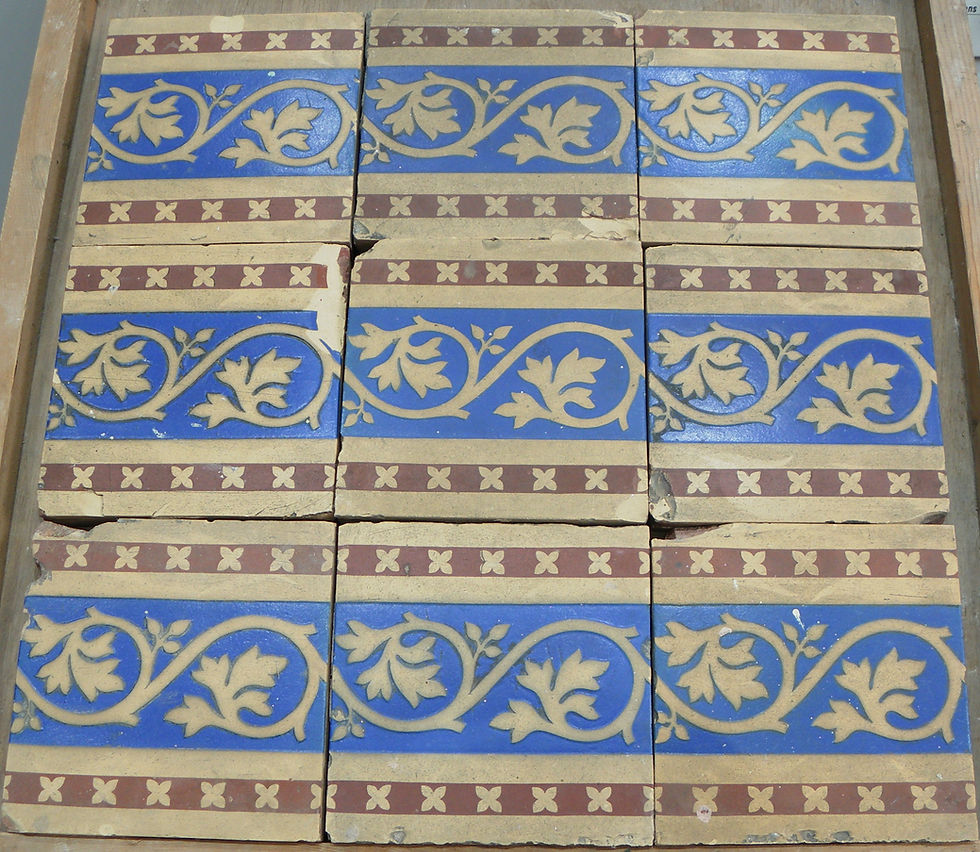 Thumbnail: Collection of 47 blue, red and buff foliate scroll border tiles