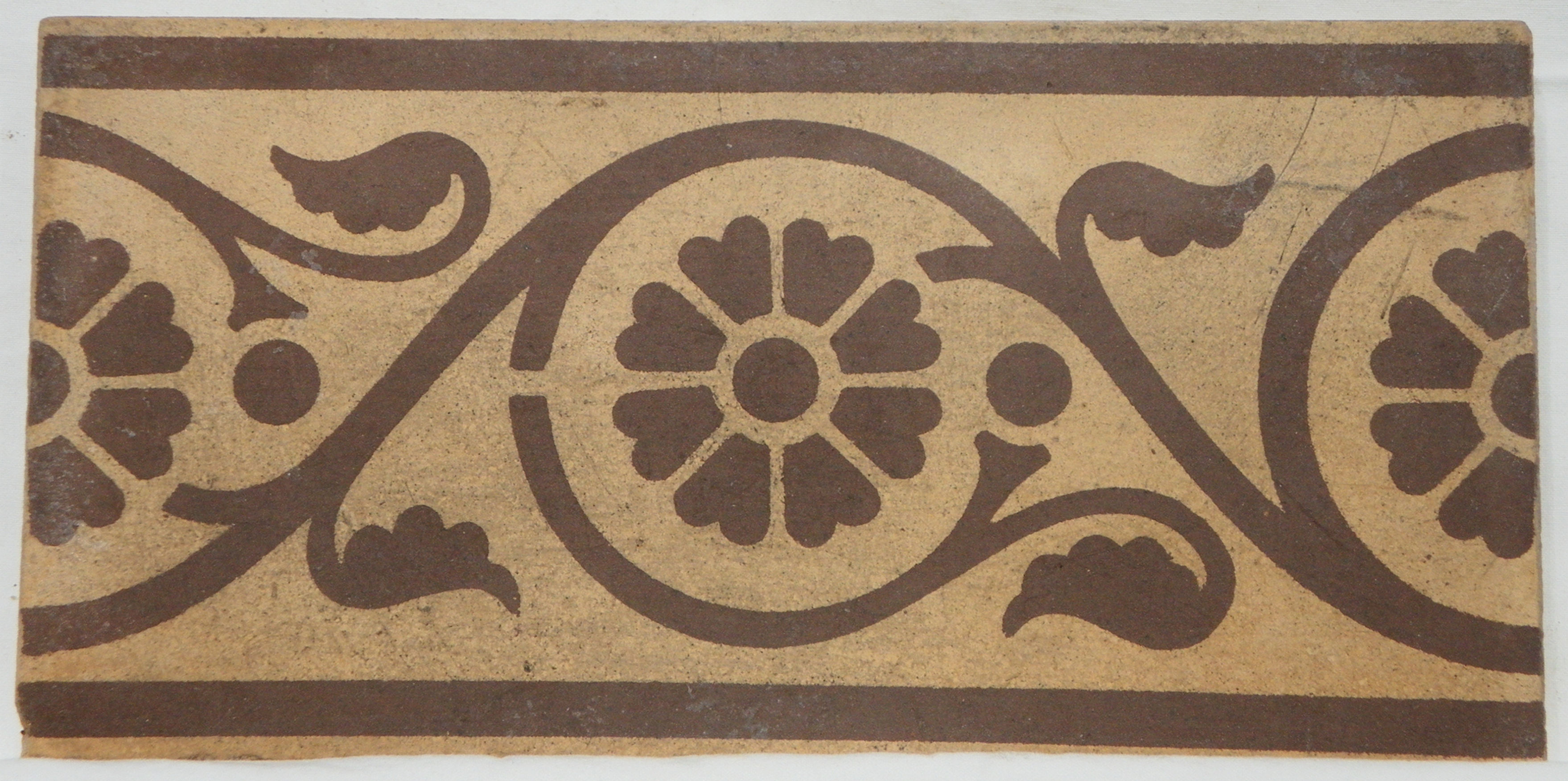 Floral scroll - brown and buff