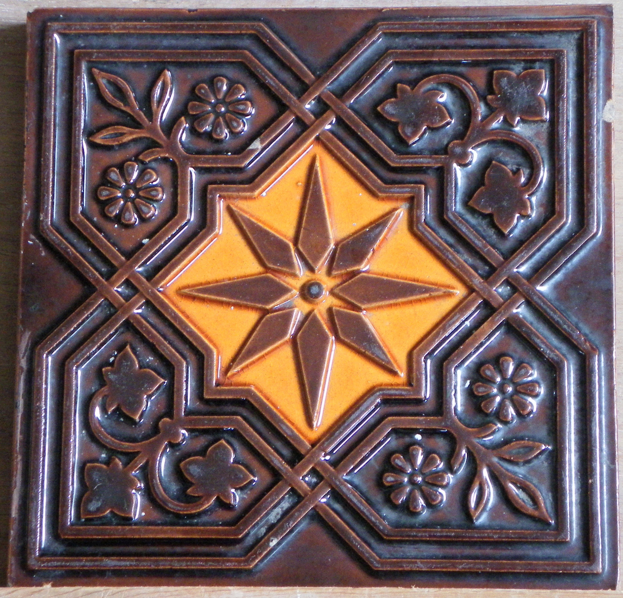 Geometric orange and brown star