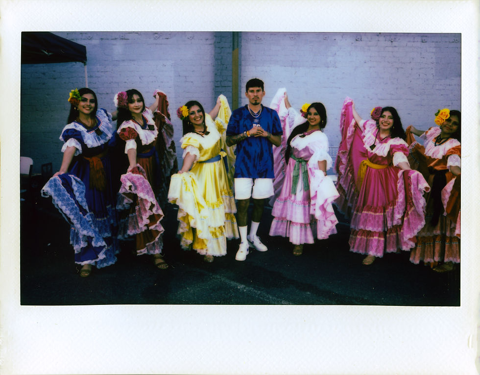 Feefa with Folkloric group, polaroid by Raymundo Archila