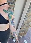 Pink Princess Philodendron arm  sleeve tattoo designed and tattooed by Ocala florida tattoo artist Aubrey at The Tattoo Gallery of Ocala in Ocala Florida