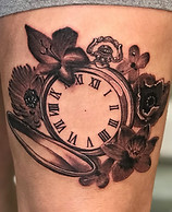 Black and grey pocket watch and flowers tattoo designed and tattooed by Gregg