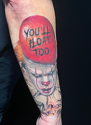 Pennywise the clown horror tattoo created by Ocala florida tattoo artist Gregg at The Tattoo Gallery of Ocala, LLC
