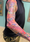 Custom Color Neo Traditional Japanese koi arm sleeve created by Ocala Florida tattoo artist Gregg at The Tattoo Gallery of Ocala