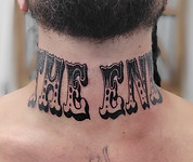 black and grey lettering the end neck tattoo