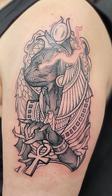 black and grey egyptian goddess tattoo