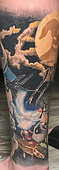 Custom Color Nightmare Before Christmas leg sleeve created by Ocala Florida tattoo artist Gregg at The Tattoo Gallery of Ocala