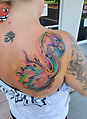 Watercolor flamingo tattoo designed and tattooed by Ocala florida tattoo artist Aubrey at The Tattoo Gallery of Ocala in Ocala Florida