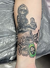 Black and Grey spooky skeleton and poison tattoo designed and tattooed by Ocala florida tattoo artist Aubrey at The Tattoo Gallery of Ocala in Ocala Florida