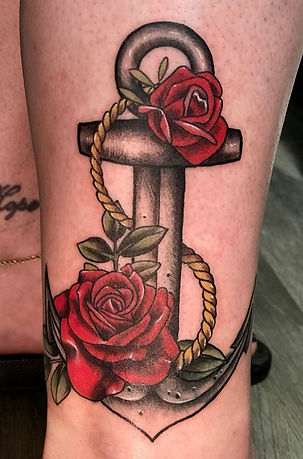 Color rose and anchor tattoo designed and tattooed by Gregg