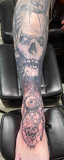 Dark arts demon eyeball tattoo designed and tattooed by Ocala Florida tattoo artist Gregg at The Tattoo Gallery of Ocala, LLC