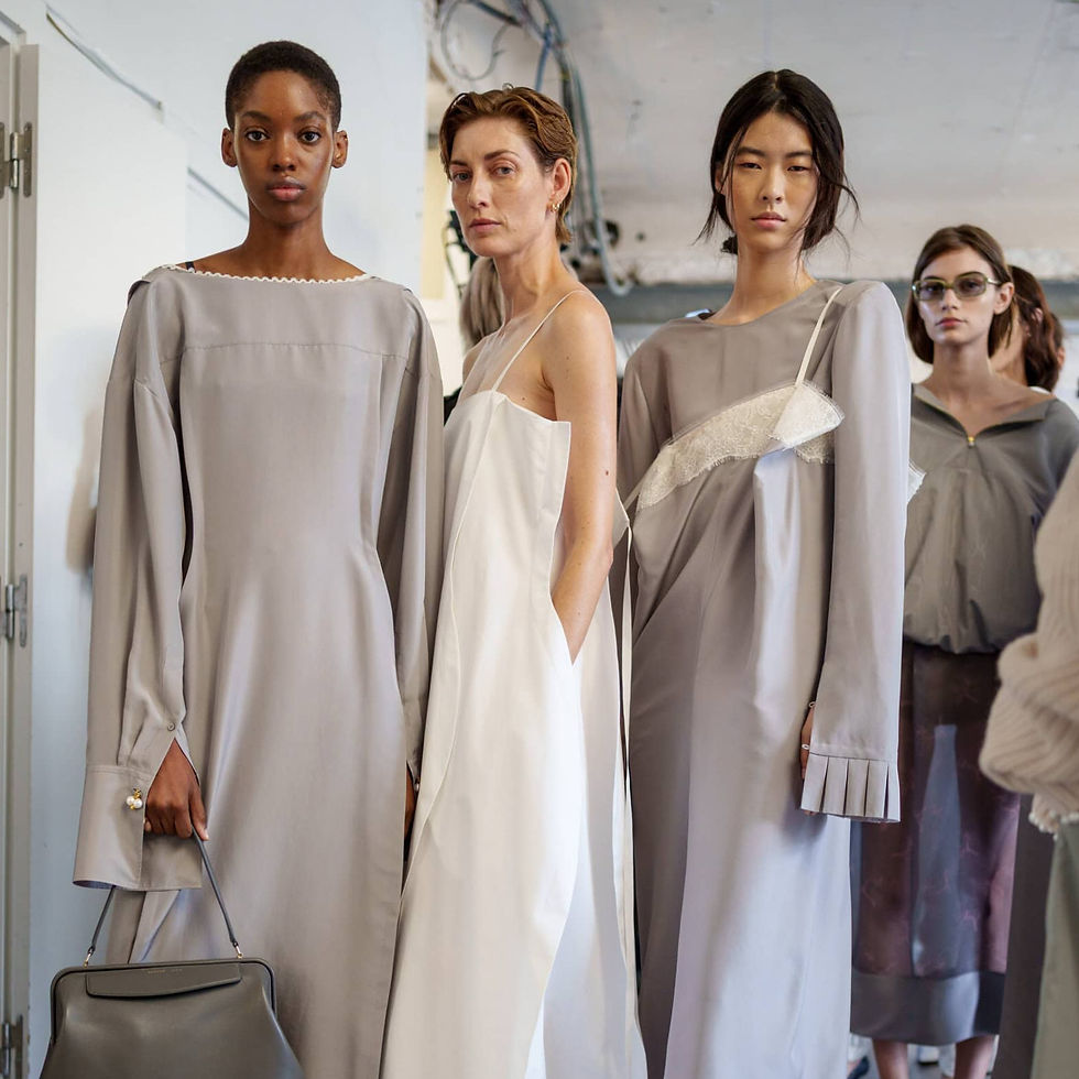 Soft silhouettes traverse through a color palette of stark whites, smoky blacks and soft ecrus. Photo:theimpression.com