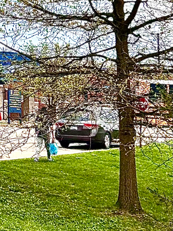 Neal heading to work, a small bag in hand, a simple exchange between two mornings. Not a perfect photograph, but a perfect moment just the same.
