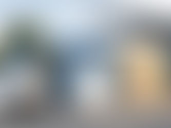 Modern EV charging infrastructure combining solar panels, rapid chargers, and battery storage at a commercial site