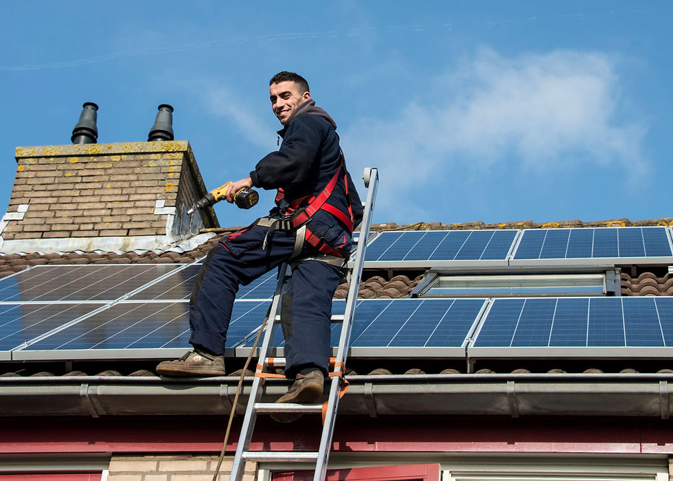 man installing solar panels