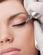 Permanent eye liner cosmetic on a woman