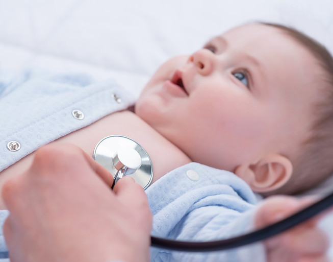 Pediatrician Examining Infant