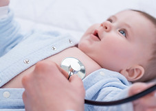 Pediatrician Examining Infant