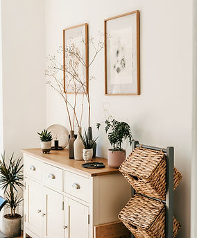 brown woven basket on white wooden cabin