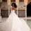 Thumbnail: The Odette by WONA Concept gown glowing under soft lighting, highlighting its luxurious fabric and graceful silhouette.