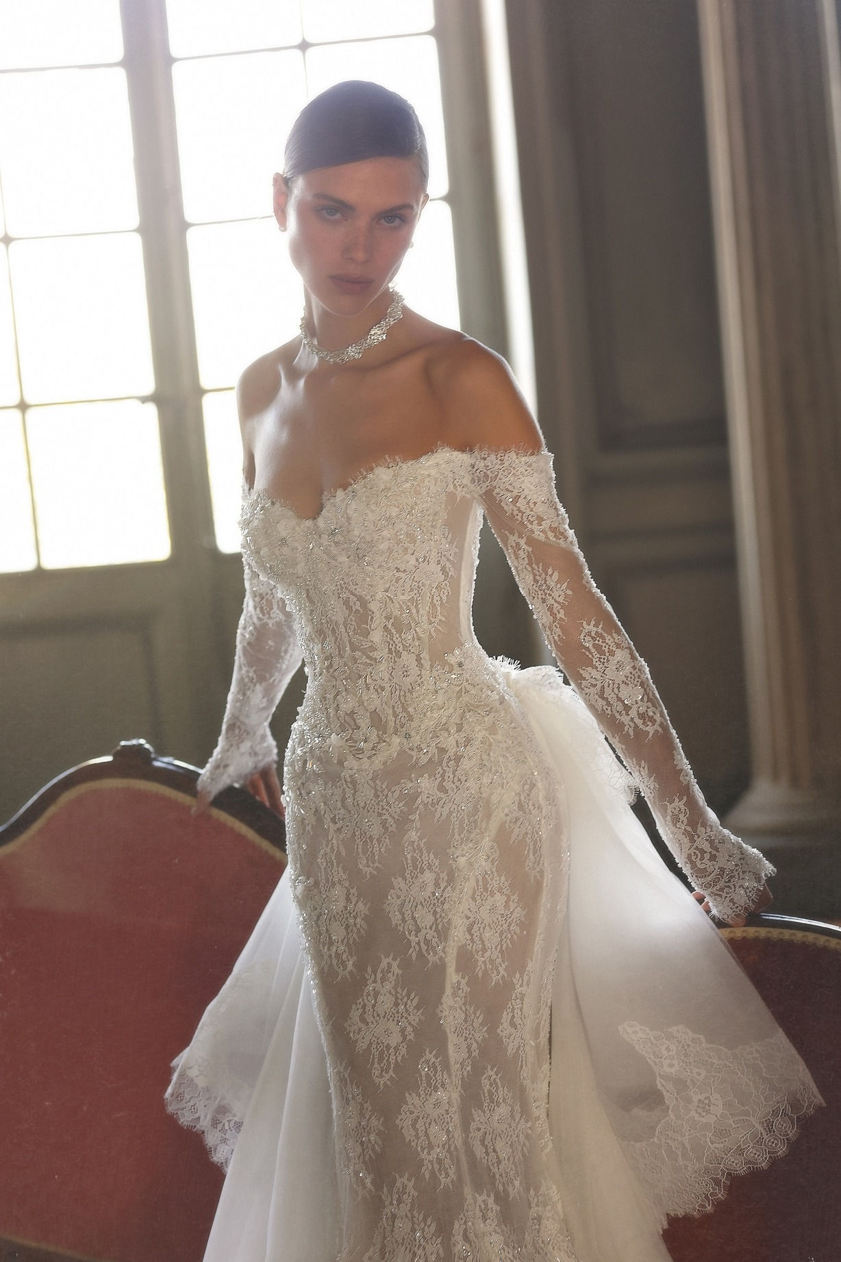 Lace mermaid wedding dress with detachable overskirt and corset bodice