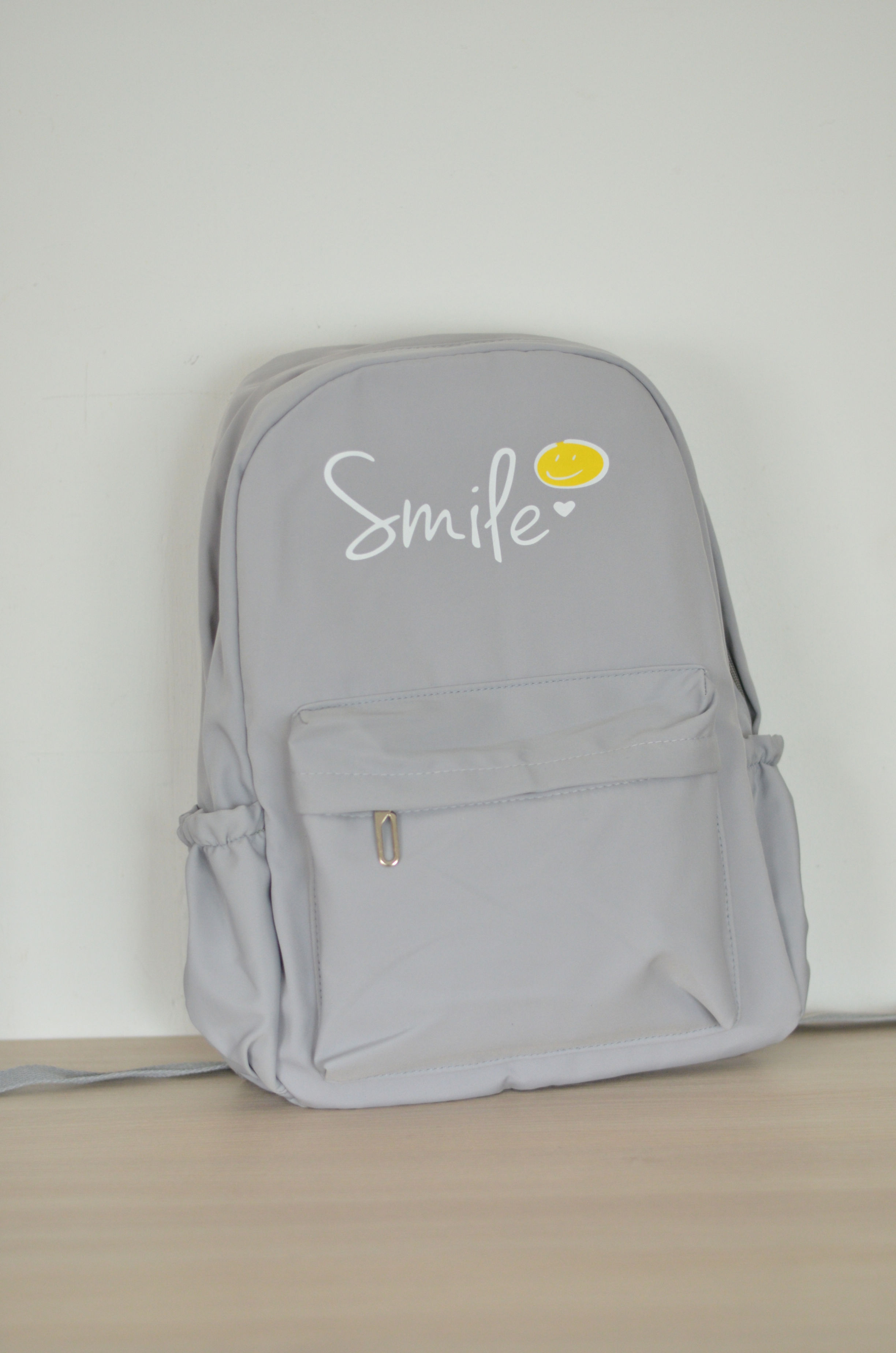 MOCHILA SMILE GRIS