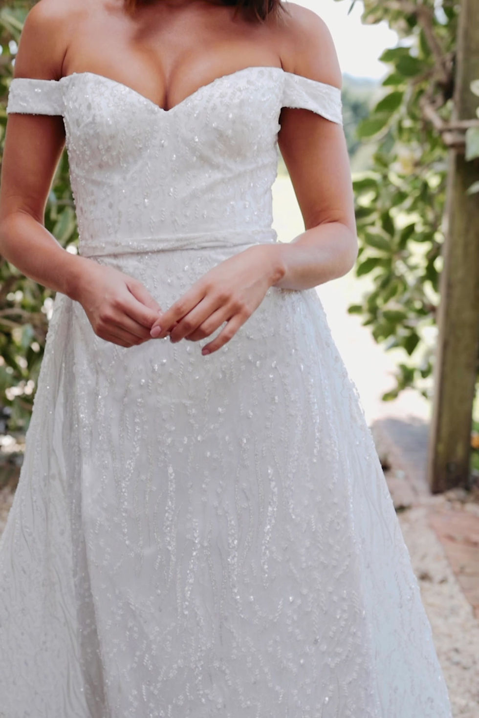 Thumbnail: Tania Olsen Adrienne wedding dress available at Gail's Wedding Emporium