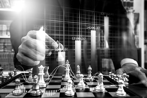 Chess game on chess board on stock market or forex trading graph chart for financial inves
