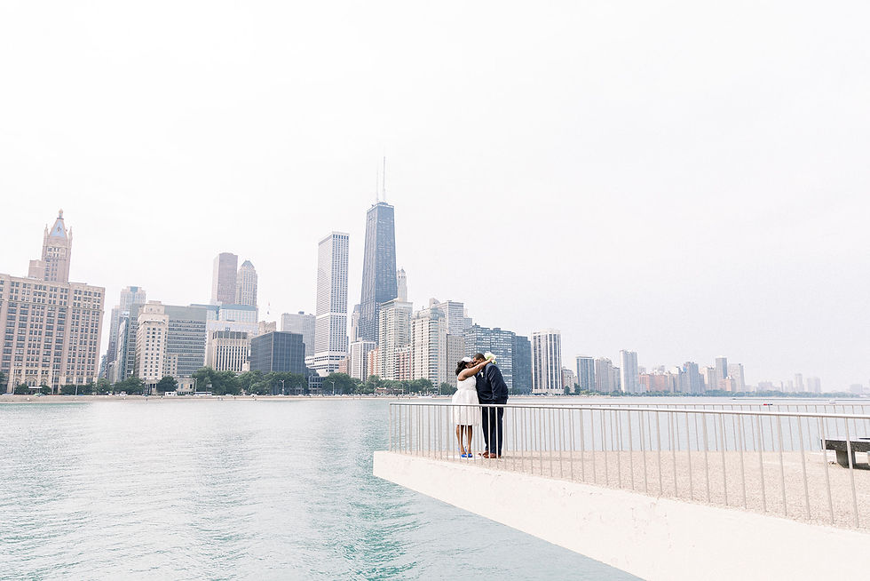 A bride and groom overlooking the Chicago skyline