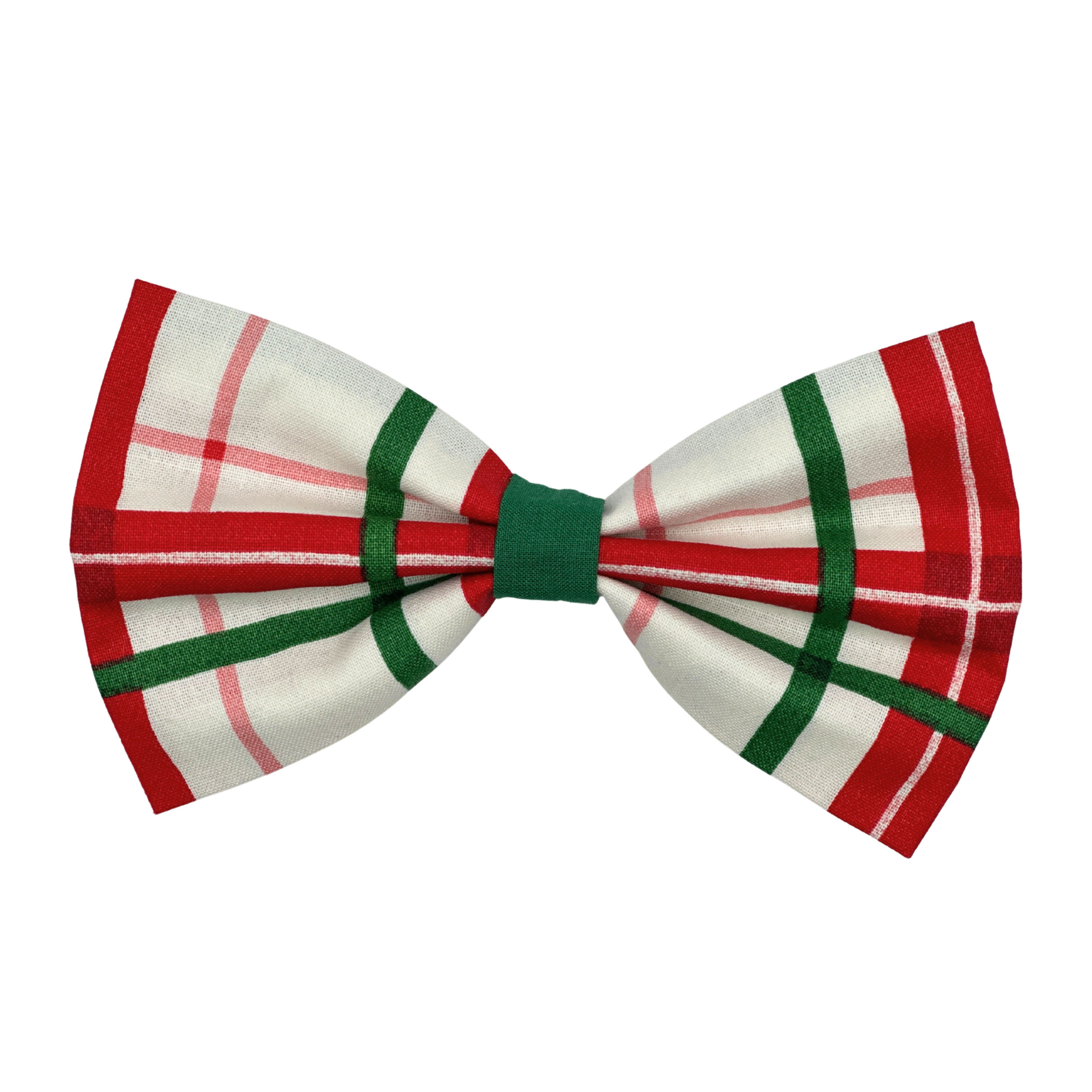 White dog bow tie with red and green plaid lines and green center band.